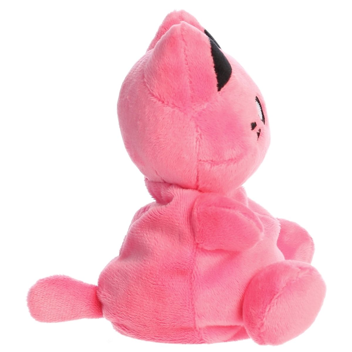 Side profile view of the Palm Pals Vivid Pink Meowchi highlighting its plump, rounded shape and little plush tail.