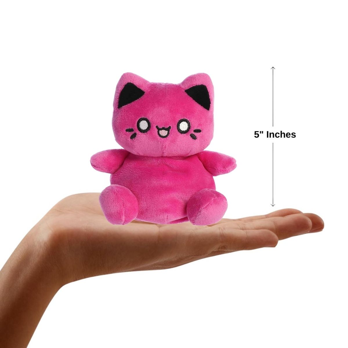 Sizing graphic showing the 5-inch Palm Pals Cosmic Purple Meowchi plush sitting perfectly in the palm of a hand to demonstrate its small scale.