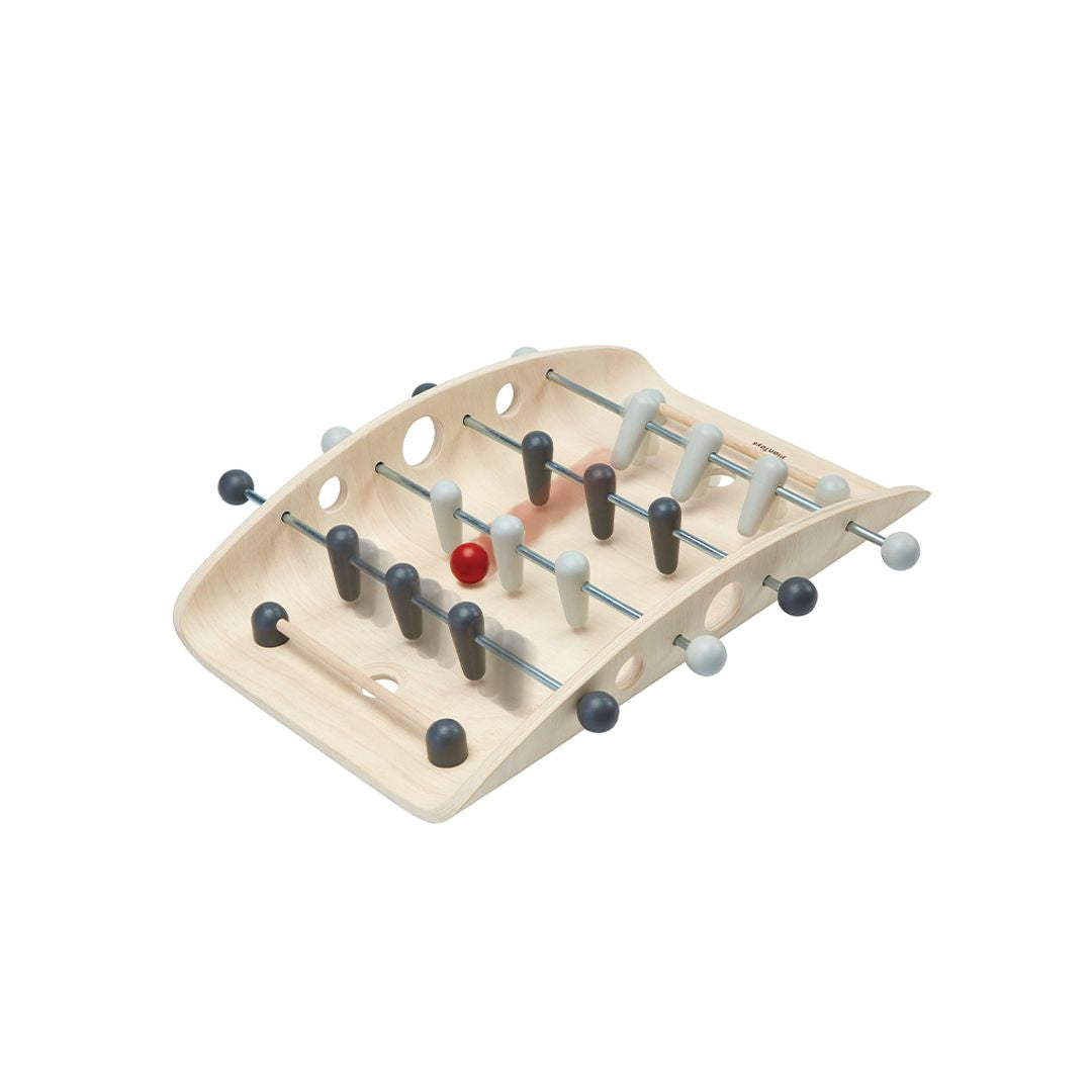 Detailed view of the earth-friendly PlanToys tabletop sports game ready for hands-on, screen-free family fun.