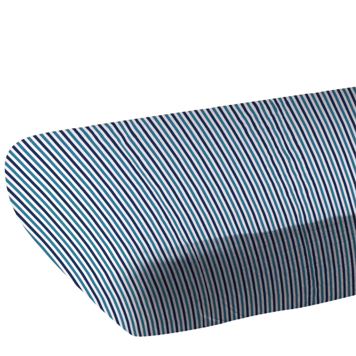 Close-up of the blue and white pinstripe bamboo muslin fabric showing the fitted corner of the crib sheet.