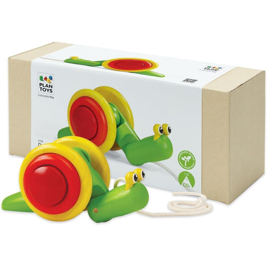 PlanToys wooden pull-along snail toy featuring a bright green and yellow shell and its box