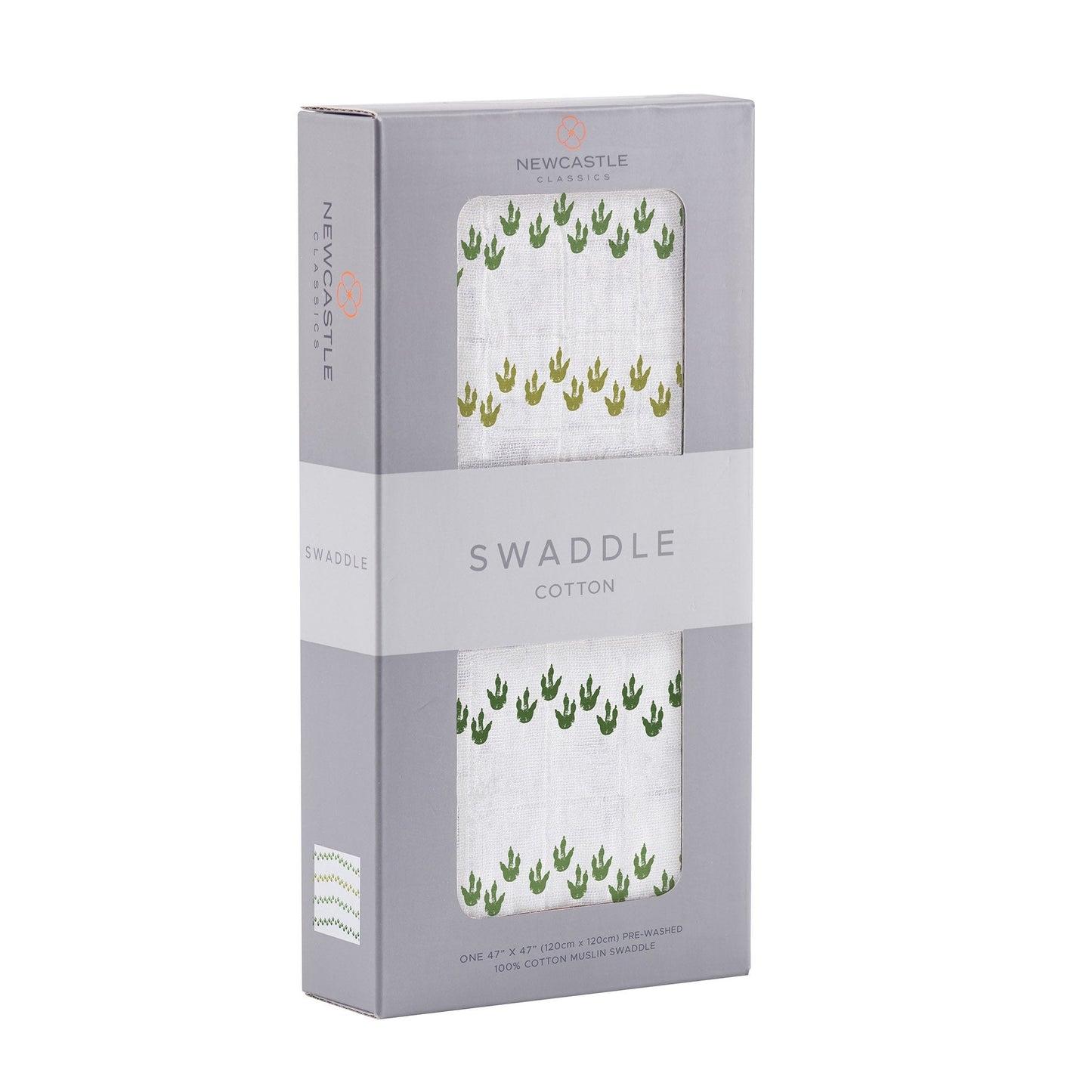 Angled front view of the packaged Dino Feet baby swaddle blanket folded inside a grey Newcastle Classics window display box.