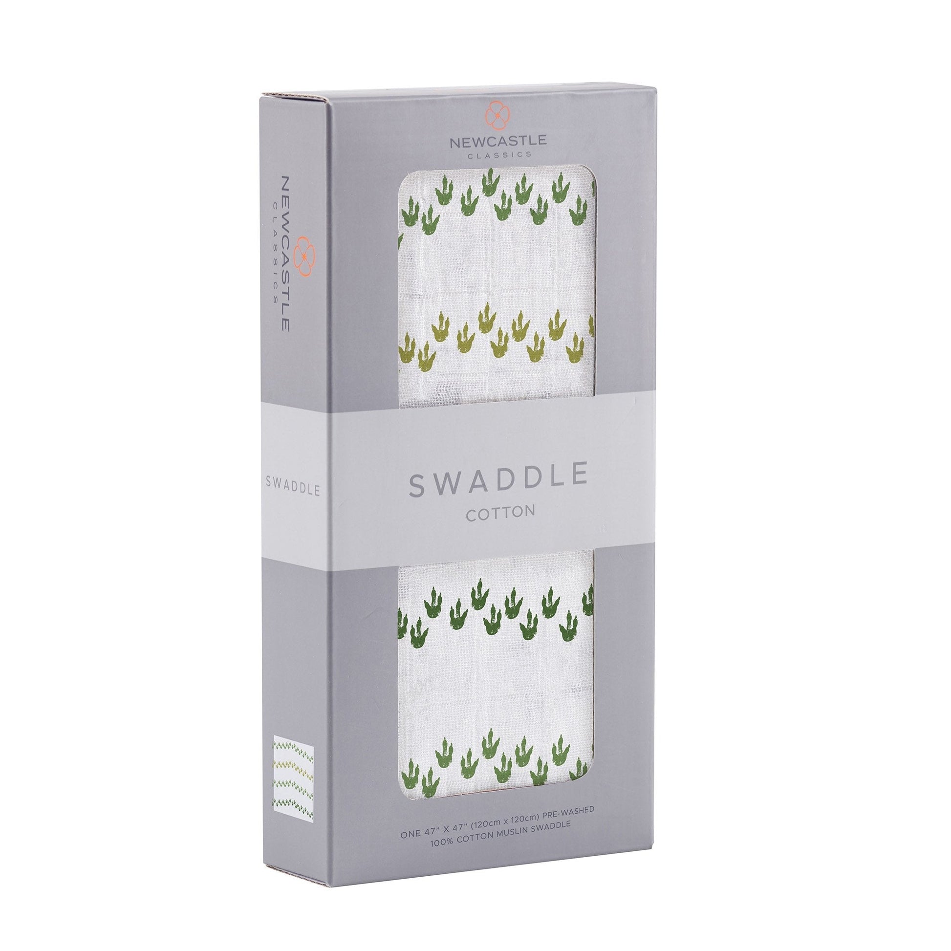 Angled front view of the packaged Dino Feet baby swaddle blanket folded inside a grey Newcastle Classics window display box.