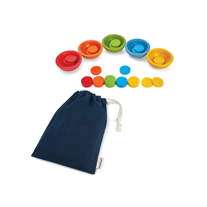 The complete PlanToys sort and count educational toy set laid out next to its handy blue storage pouch.