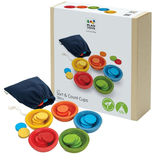 The PlanToys wooden sort and count cups toy displayed next to its eco-friendly packaging and convenient storage bag.