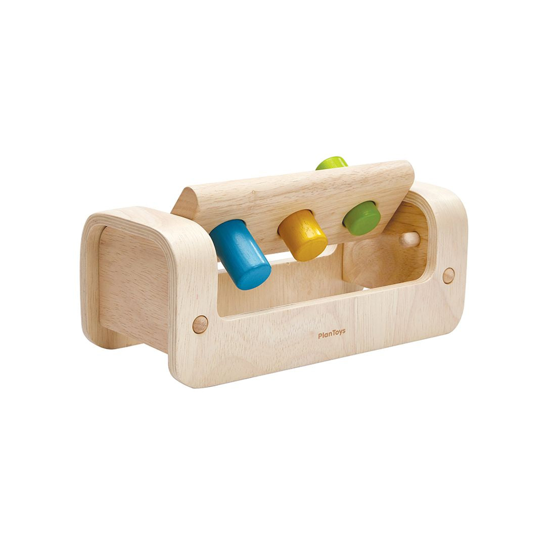 Side profile of the durable PlanToys wooden hammer toy highlighting its reversible, toddler-safe design.