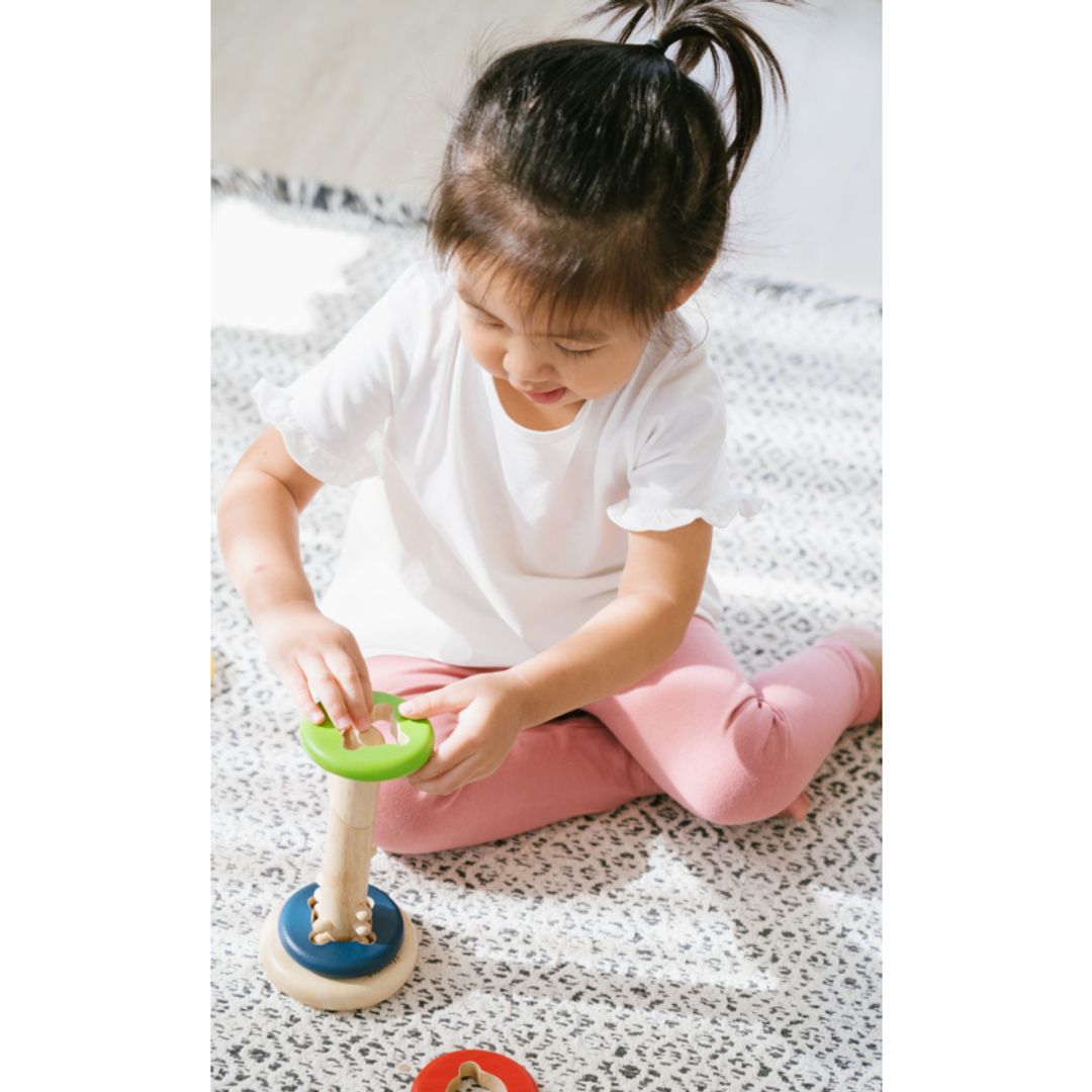 PlanToys® Twist & Sort Wooden Stacking Toy with Twisting Rod