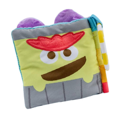 The back cover of the soft fabric baby book showing Oscar the Grouch smiling inside his grey trash can.