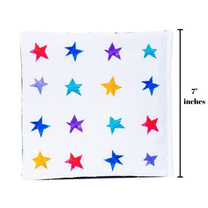 The star-patterned back cover of the soft fabric book displayed next to a 7-inch vertical height graphic indicator.