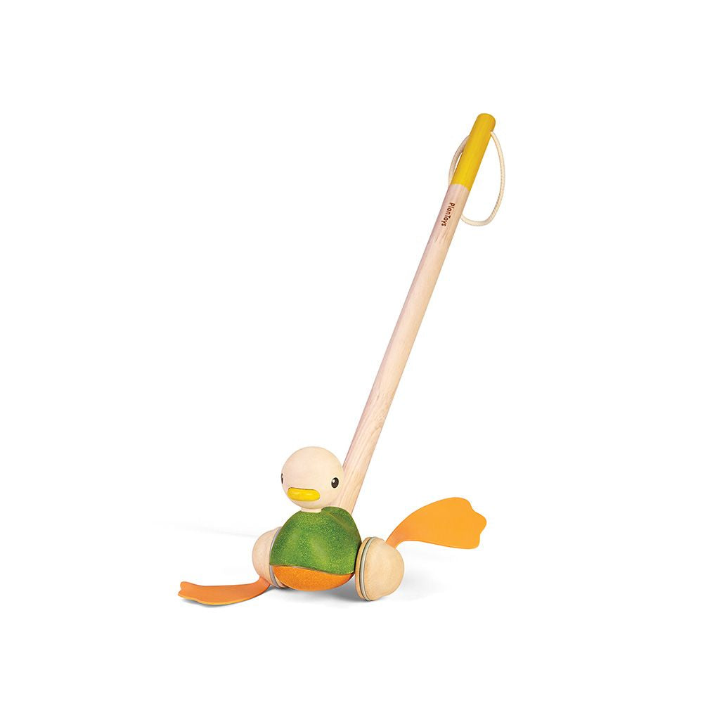 Front view of the eco-friendly PlanToys wooden push along duck toy with smooth rolling wheels.