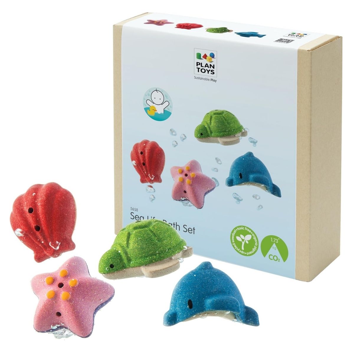 The eco-friendly PlanToys sea life bath set displayed next to its sustainable cardboard packaging.