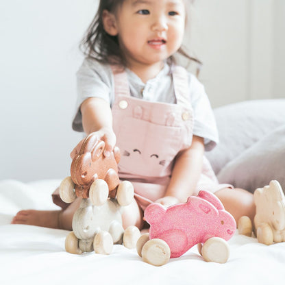A young child developing fine motor skills 