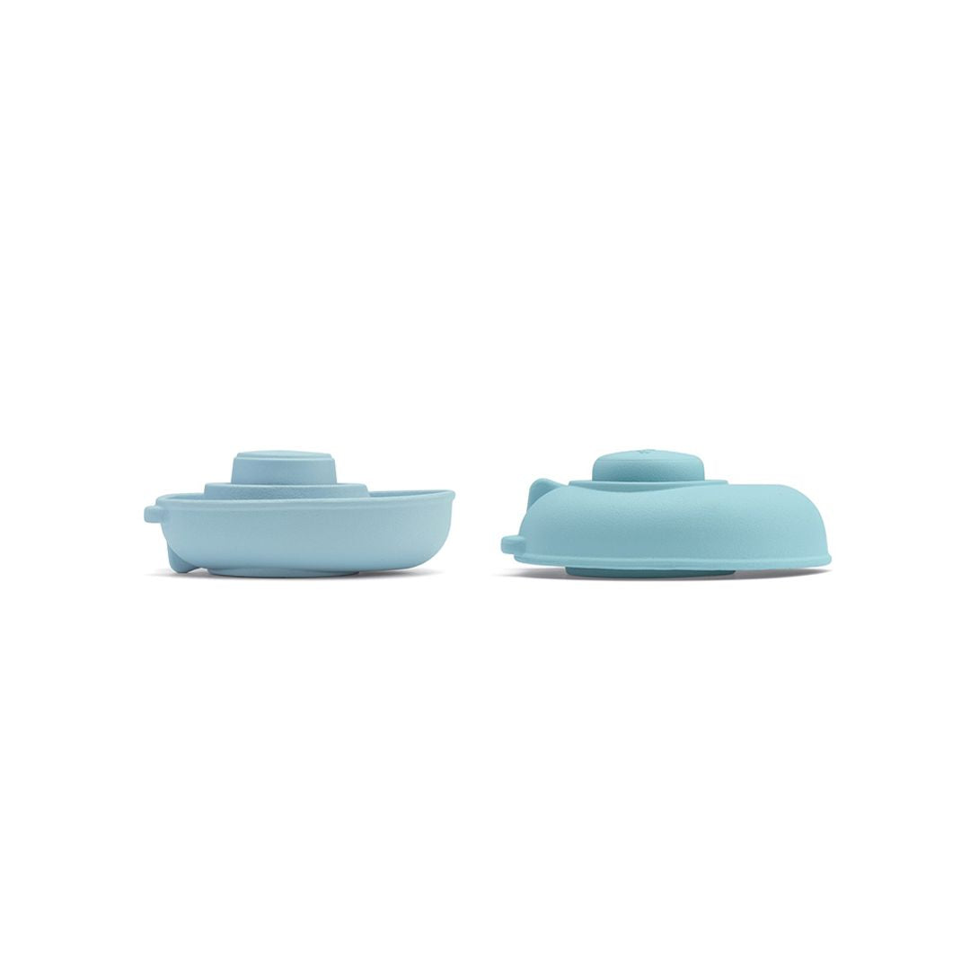 Side-by-side view showing the PlanToys rubber water toy in both its boat and submarine configurations.