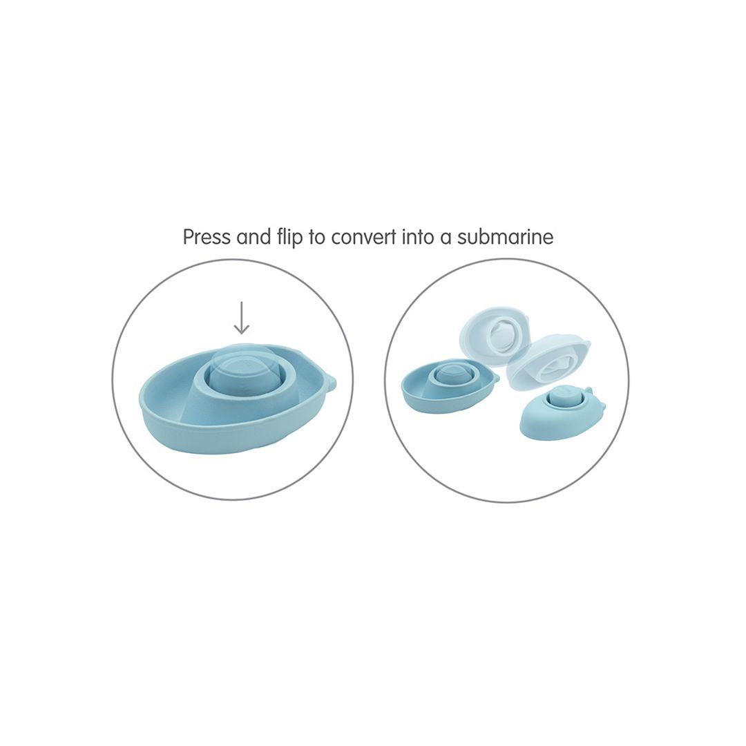 Instructional graphic demonstrating how to press and flip the inner cabin to convert the PlanToys boat into a submarine.