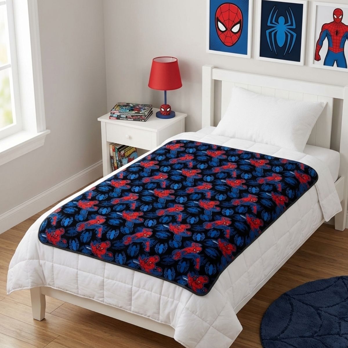 Lifestyle bedroom shot showing the Spider-Man pattern blanket draped beautifully over a child's bed.