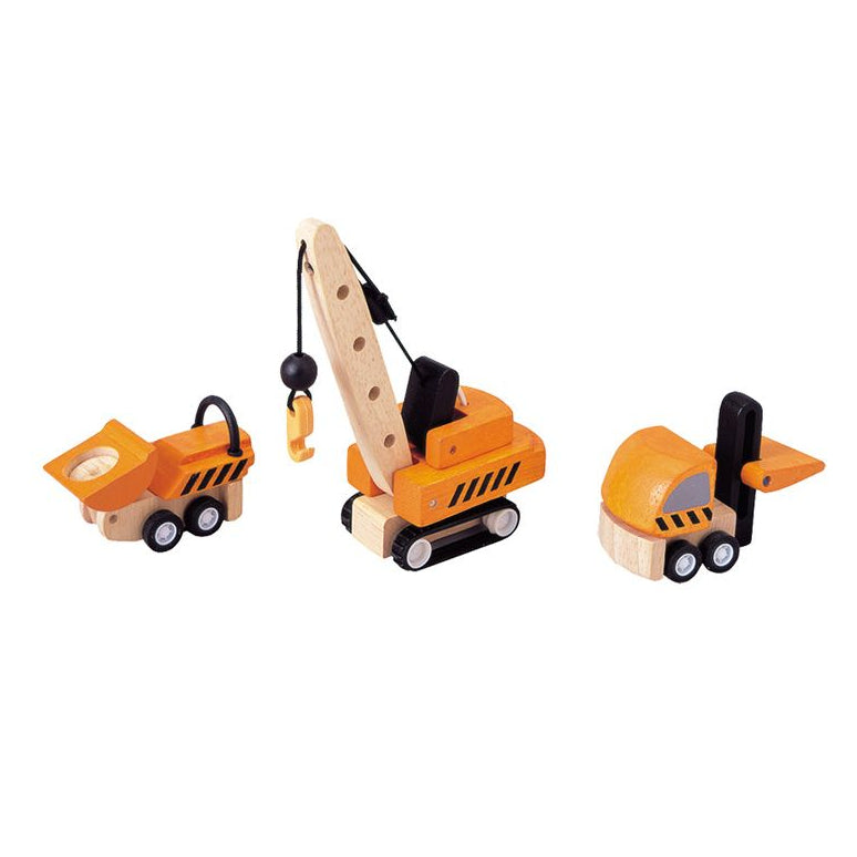 The PlanToys wooden construction vehicle set featuring a yellow crane, forklift, and dump truck.
