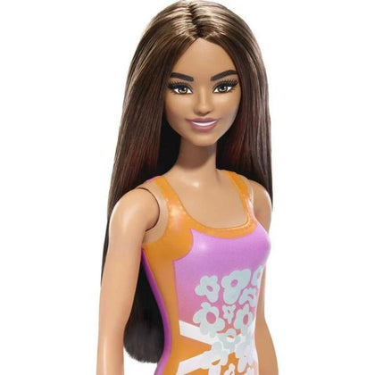 Beach Barbie Doll with Brown Hair Wearing Pink Floral Print Swimsuit