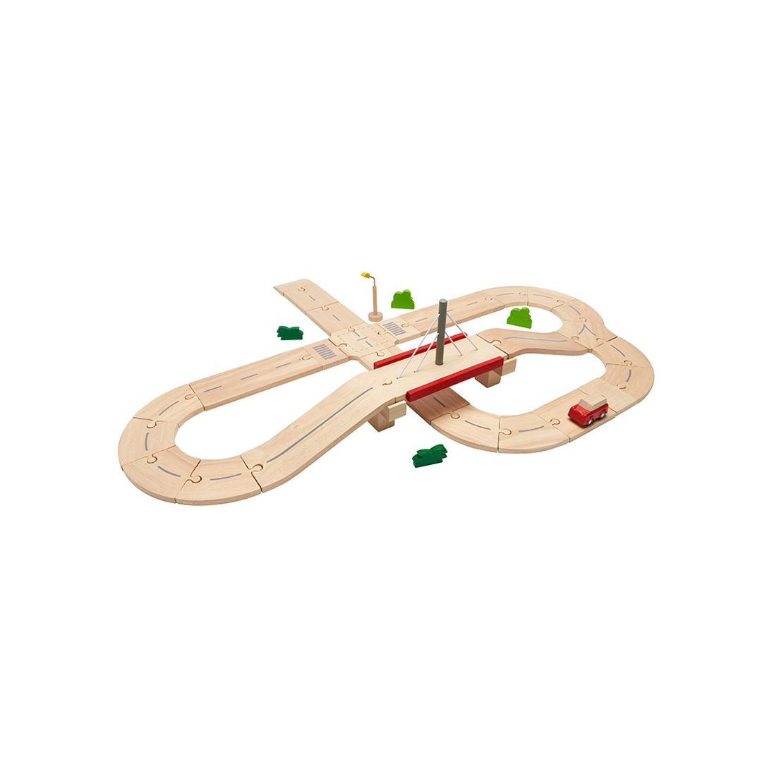 assembled PlanToys wooden track system, ready for endless miniature city planning.