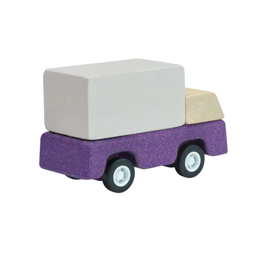 Back view showing the smooth rolling wheels on the PlanToys eco-friendly purple truck.