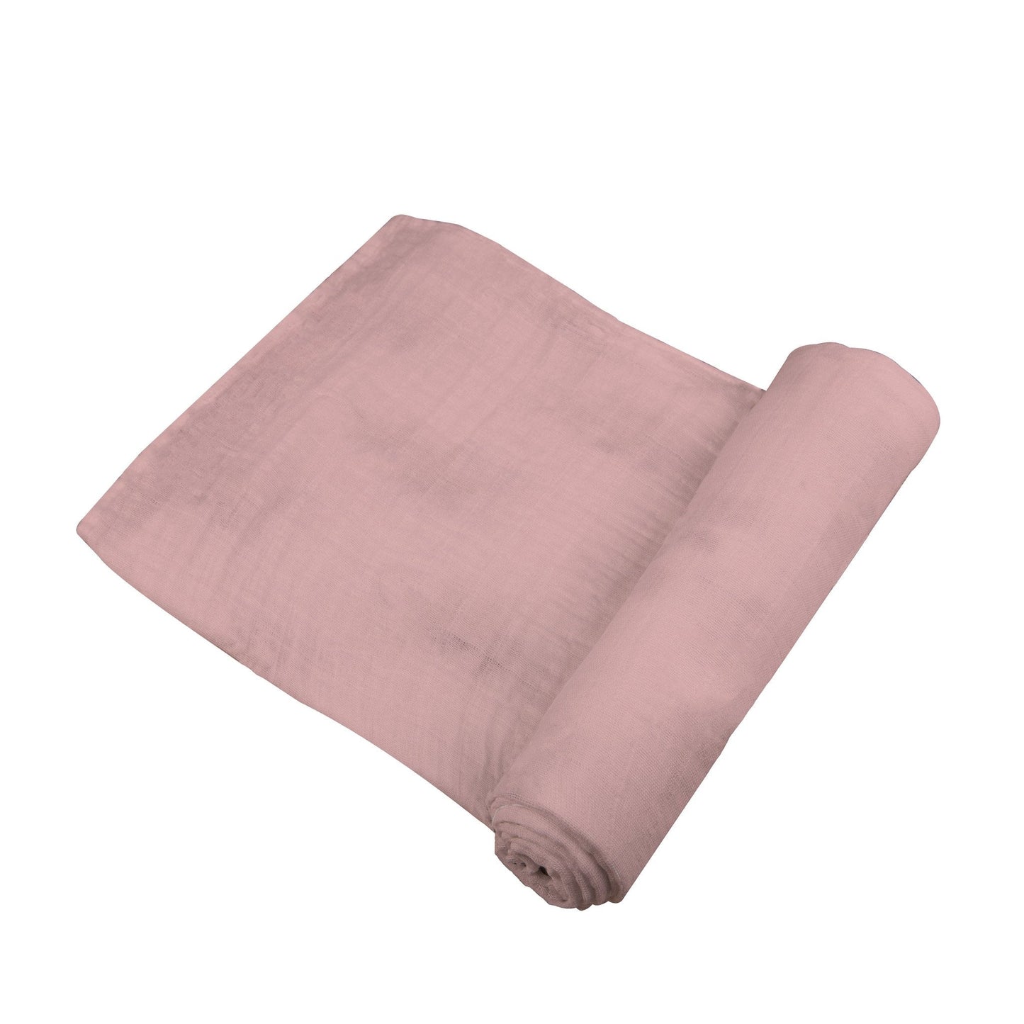 Angled view of the solid pink Pink Rose bamboo muslin swaddle blanket partially unrolled to show its soft texture.
