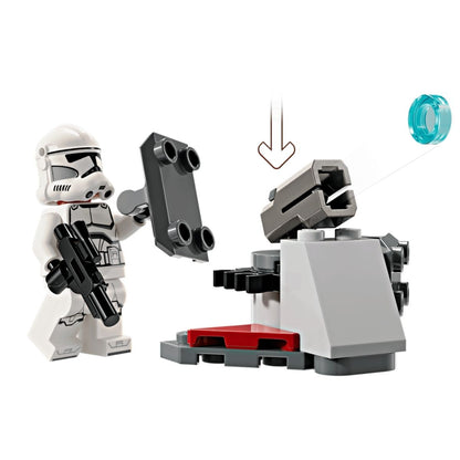 A Clone Trooper taking cover behind the buildable gray defense post and firing the integrated translucent blue stud-shooting gun.