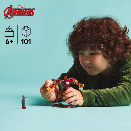 Child playing with Marvel Avengers toy set on a light blue background