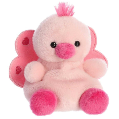 Aurora 5-inch Palm Pals Freya Peacock plush toy sitting forward showing its pastel pink body, bright hot-pink beak and feet, fuzzy pink head crest, and heart-detailed tail feather fan behind it.