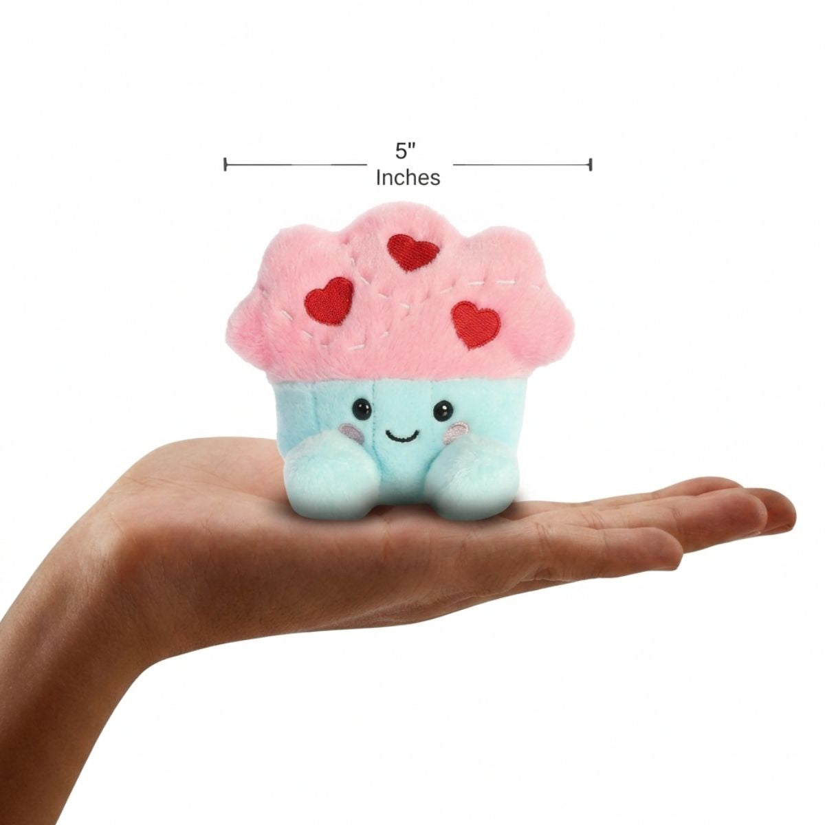 The miniature Candace Cupcake plush sitting balanced in an open human hand under a 5-inch height graphic indicator.