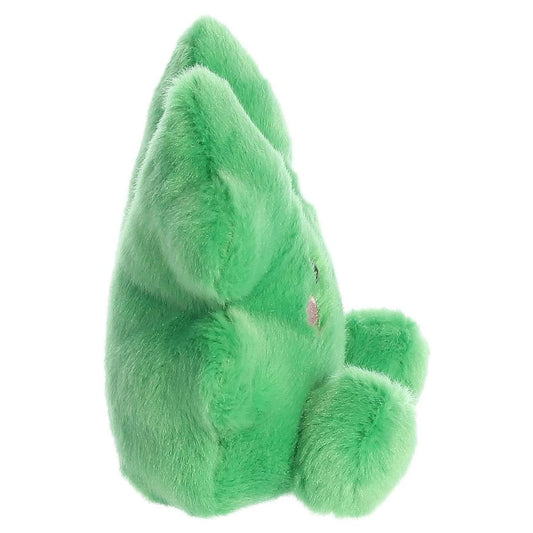 Side profile view of the Chance Clover plush highlighting its soft green body and little plush feet.