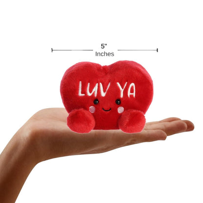 The miniature red candy heart plush balanced in an open human hand under a 5-inch height graphic indicator.