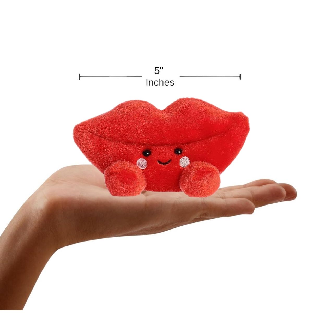 Sizing graphic showing the 5-inch Palm Pals Kissie Lips plush sitting perfectly in the palm of a hand to demonstrate its small scale.