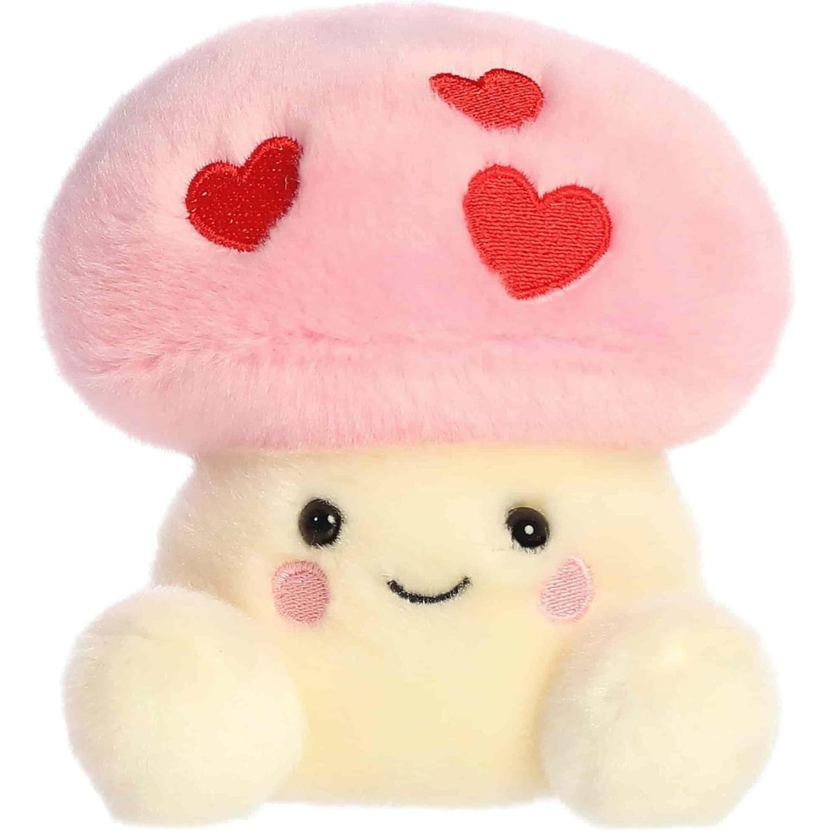Side profile view of the Palm Pals Brooklyn Mushroom highlighting the fluffy texture of the pink heart-spotted cap and its rounded shape.