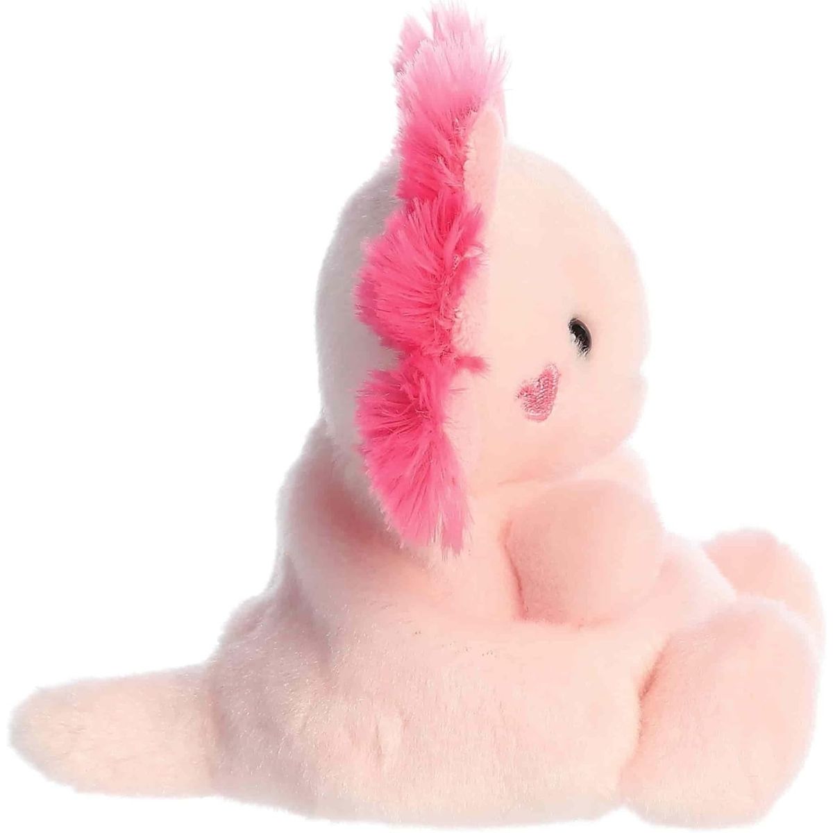 Side profile view of the Palm Pals Axolotl plush highlighting its perfectly squishy round body and soft pink tail.