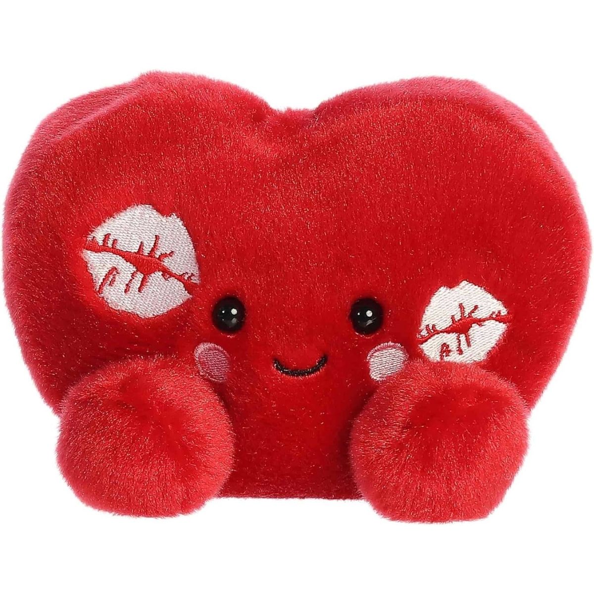 Front view of the 5-inch Aurora Palm Pals Kimi Kisses Heart plush toy featuring a bright red heart shape with two white lipstick kiss marks and a smiling face.