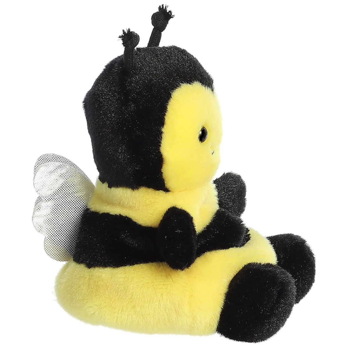 Side profile view of the Queeny Bee stuffed animal highlighting her plump shape and a shiny silver wing.