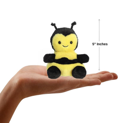 Sizing graphic showing the 5-inch Palm Pals Queeny Bee sitting perfectly in the palm of a person's hand to demonstrate its miniature scale.