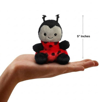 The miniature Lil Spots Ladybug plush sitting balanced in an open human hand under a 5-inch height graphic indicator.