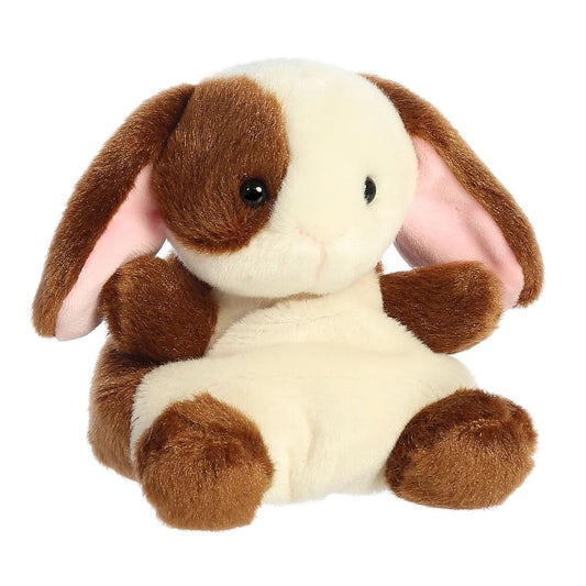 Angled view of the adorable Aurora Clover Bunny stuffed animal featuring a sweet face, dark eyes, and a cute little pink nose.