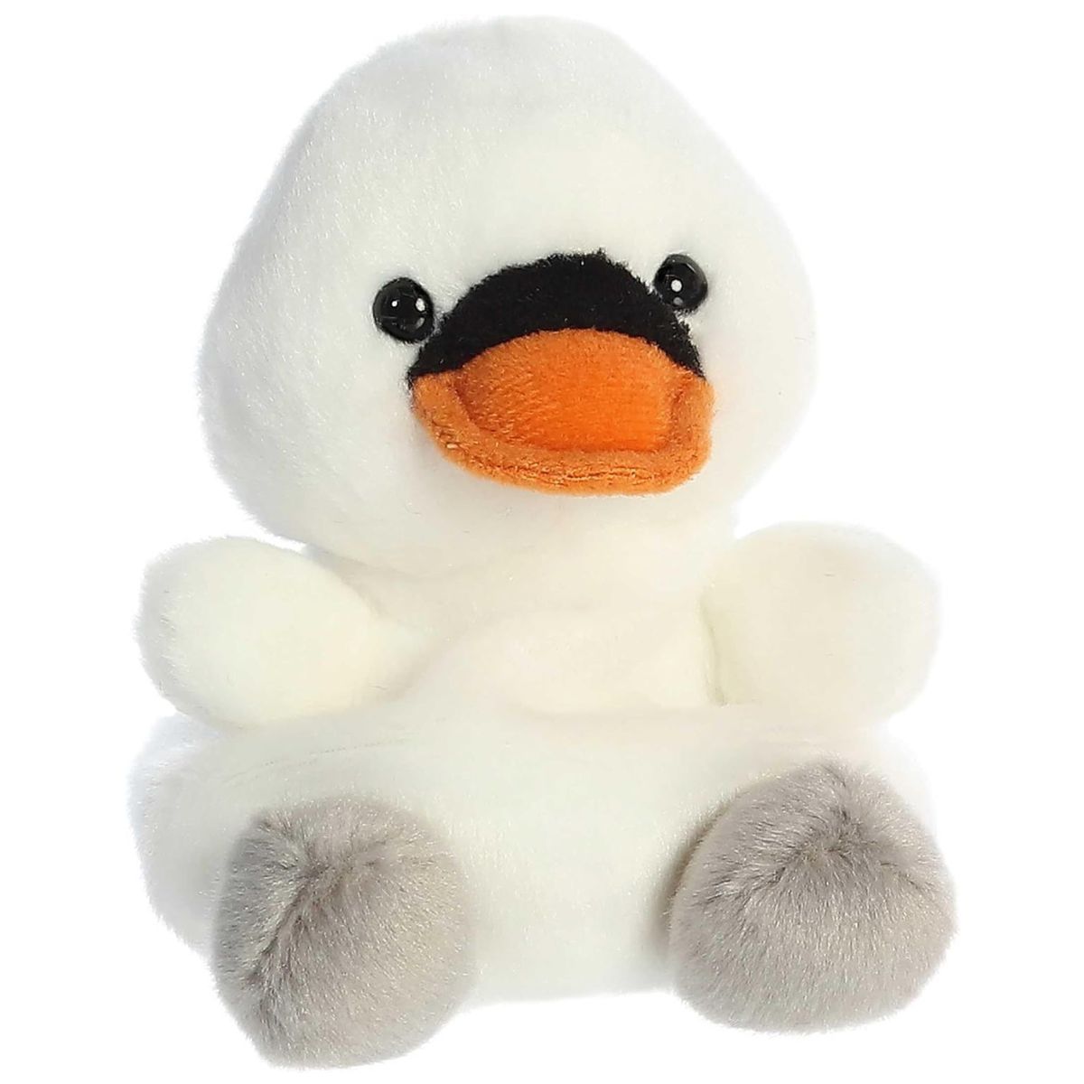 Three-quarter view of the Aurora Palm Pals Alina Swan 5-inch plush sitting upright, featuring snowy-white fur, an orange bill, and grey feet.