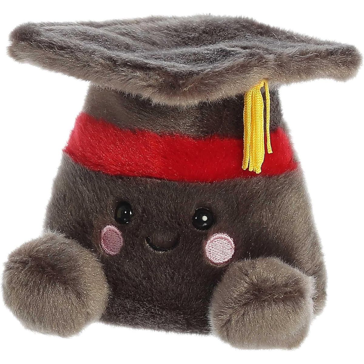 Front view of the mini graduation cap plush sitting balanced on a human hand with a dimension line indicating its 5-inch height.