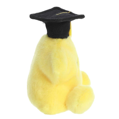 Side profile of the Aurora Palm Pals Graduation Star plush highlighting its black cap and round body.
