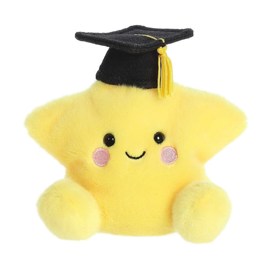 Front view of the 5-inch Aurora Palm Pals Magna Graduation Star plush toy wearing a black cap with a yellow tassel.