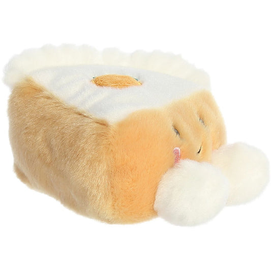 Front angled view thumbnail of the cute Carrie Carrot Cake plush sitting straight, highlighting its friendly expression, rosy cheeks, and fluffy white feet.