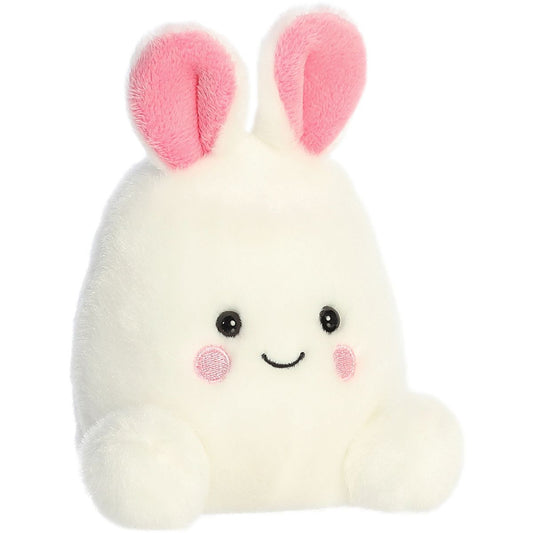 Aurora 5-inch Palm Pals Bouncy Bunny Egg plush toy sitting at an angle showing its white egg-shaped body, bright pink inner ears, and smiling face.