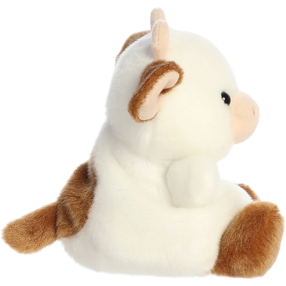 Side profile view of the Palm Pals Brown Cow plush highlighting its round, perfectly squishy body and little arms.