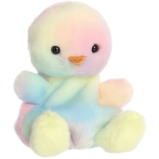 Aurora 5-inch Palm Pals Aura Rainbow Chick plush toy sitting at an angle showing its pastel rainbow swirl fur, shimmering golden beak, and soft yellow feet.