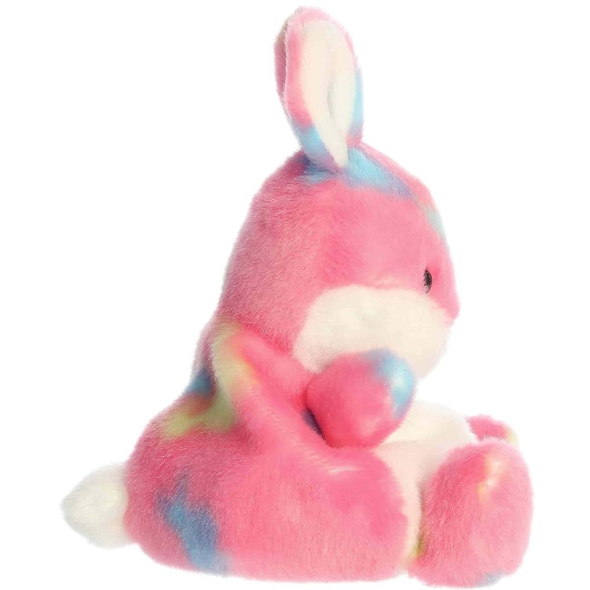 Side profile view of the Palm Pals Bubblegum Jellybean Bunny highlighting its plump, rounded shape and little plush paws.