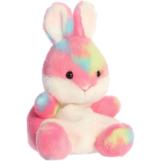 Front angled view of the 5-inch Aurora Palm Pals Bubblegum Jellybean Bunny plush toy featuring a bright pink tie-dye coat with blue, yellow, and green splashes.