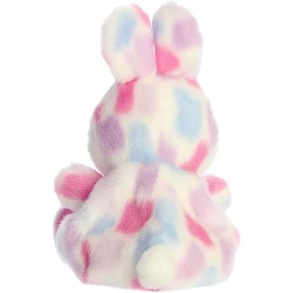Back view of the Aurora bunny plush showcasing its colorful pastel spotted coat and tiny plush tail.