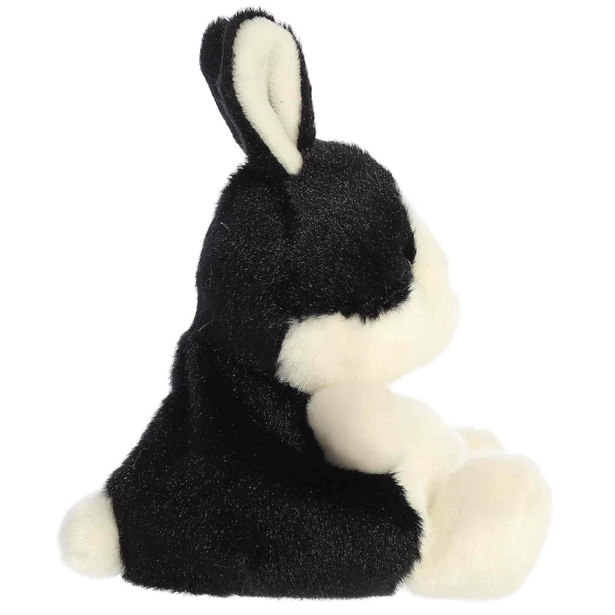Side profile of the Aurora Palm Pals Jan Dutch Bunny plush highlighting its round shape and white tail.
